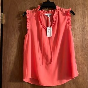 Coral polyester ruffled sleeveless top